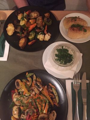 Vegetable stir fry with basmati rice, honey roasted veggies and roasted potatoes at Aubergine in Bucharest