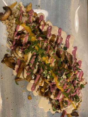 Quinoa, soy and mushroom with tahini saucee  at Aubergine in Bucharest