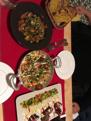 Mediterranean salad, vegan aubergine, three types falafel and bread at Aubergine in Bucharest