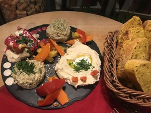 250g vegan mix platter with a side of delicious bread  at Aubergine in Bucharest
