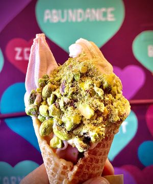 Strawberry, peach, pistachios w/ vegan cone✨delicious!  at Yoga-urt in Glendale