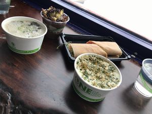 Broccoli Cheddar soup + Chickpea Miso soup + Coconut Wrap + dessert at Thrive in Boulder