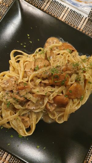 Fettuccine con funghi porcini freschi e crema al tartufo at Ma va' in Rome