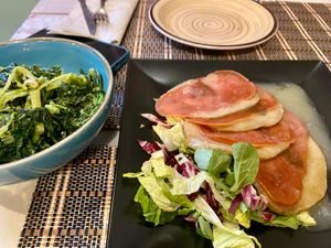 Vegetable side and homemade seitan dish at Ma va' in Rome
