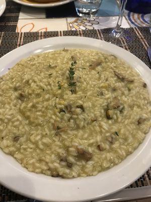 Risotto with zucchini cream and mushrooms   at Ma va' in Rome