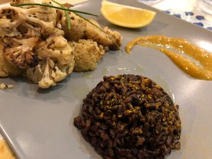 Antipasti cauliflower and black rice at Ma va' in Rome