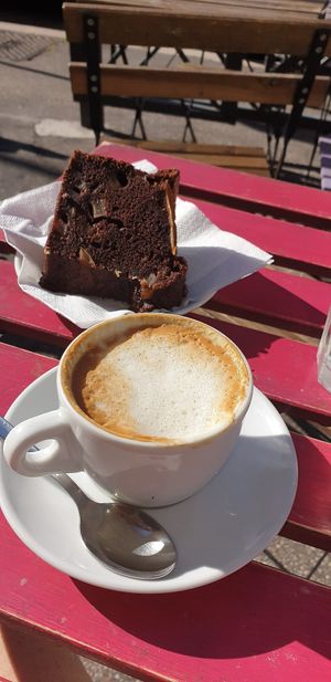 Decaffeinated cappuccino and cake for breakfast at Breaking Bread Bistrot in Rome