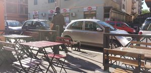 The outside seating area, very near a market at Breaking Bread Bistrot in Rome