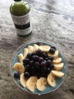 the blue majik bowl with “the tree hugger” juice  at The Green Cat in Virginia Beach