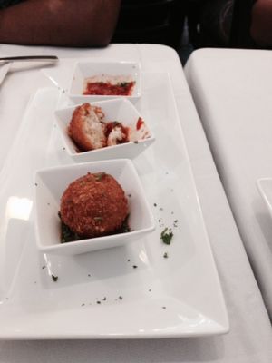 Aranciata (fried risotto balls) at 3 Brothers Vegan Cafe in Copiague