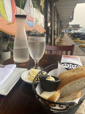 Bread before with Daya butter. One table out front was good for me and my dog.  at 3 Brothers Vegan Cafe in Copiague
