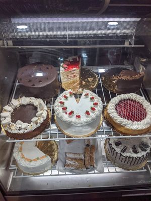 Cake display case at 3 Brothers Vegan Cafe in Copiague