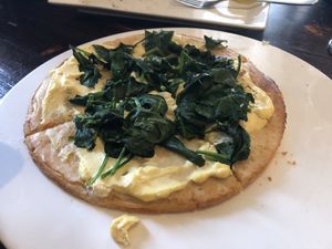 Bianca pizza- no oil no mozzarella, with spinach   at 3 Brothers Vegan Cafe in Copiague