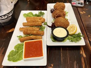 Mozzarella sticks and crab cakes  at 3 Brothers Vegan Cafe in Copiague