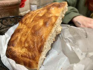 Fresh warm complimentary bread with butter  at 3 Brothers Vegan Cafe in Copiague