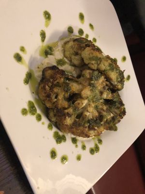 Roasted Cajun cauliflower steaks   at 3 Brothers Vegan Cafe in Copiague