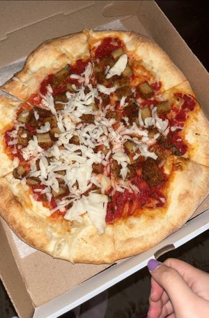 Seitan Parmesan pizza 🍕  at 3 Brothers Vegan Cafe in Copiague