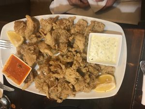 Calamari mushroom with marinara and tarter sauce  at 3 Brothers Vegan Cafe in Copiague