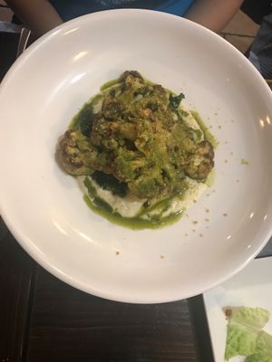 Cauliflower steak, mashed cauliflower and kale  at 3 Brothers Vegan Cafe in Copiague