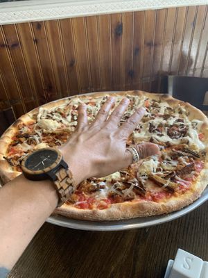 Huge pizzas! at 3 Brothers Vegan Cafe in Copiague