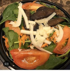 Baby spinach salad at 3 Brothers Vegan Cafe in Copiague