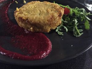 Lupin bean pattie with beetroot sauce... the portion consists of two patties  at Lizard in Rome