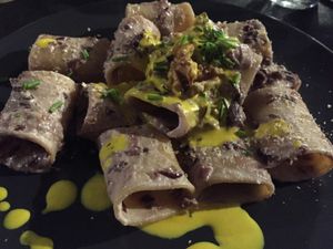 Paccheri with walnuts cream, radicchio (red chicory) and saffron sauce  at Lizard in Rome