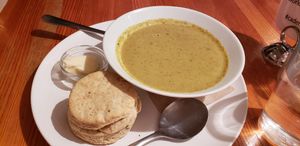 Broccoli cheese beer soup with an herbed biscuit. at Cadence in Guelph
