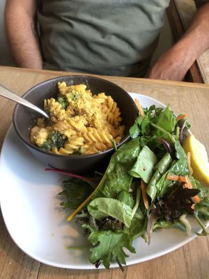 Broccoli mac n cheese so good came with a nice mixed green salad  at Cadence in Guelph