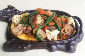 This dish is called Phu Truc Ap Chao Singapore at Angkor Vegetarian Nutrition Restaurant in Phnom Penh