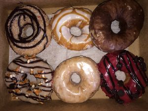 Vortex, salted caramel cream cheese, espresso, pb pretzel chocolate, vanilla, and raspberry chocolate chip at Vortex Doughnuts in Asheville