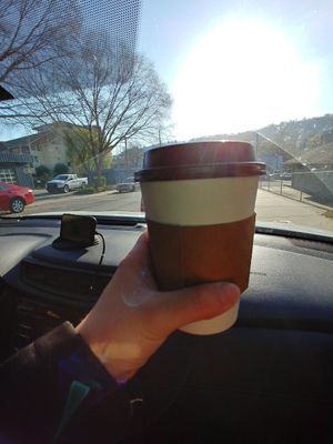 Vanilla latte with oat milk, extra sweet: good, would get again at Vortex Doughnuts in Asheville