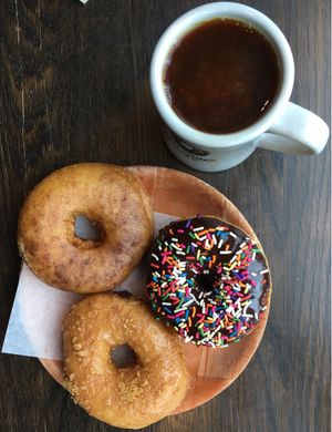 Espresso, Peach Crumble, and Chocolate Sprinkles Doughnuts  at Vortex Doughnuts in Asheville