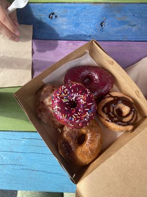 half dozen! vortex was my favorite (cinnamon sugar with chocolate)  at Vortex Doughnuts in Asheville