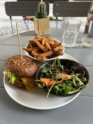 Trefoil burger with homemade cheddar, onions, lettuce, and the best chips I have ever had!!   at Beet in Luxembourg City