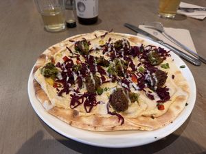 Flatbread with hummuss  at Beet in Luxembourg City