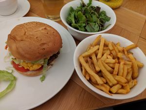 Burger with sides at Beet in Luxembourg City