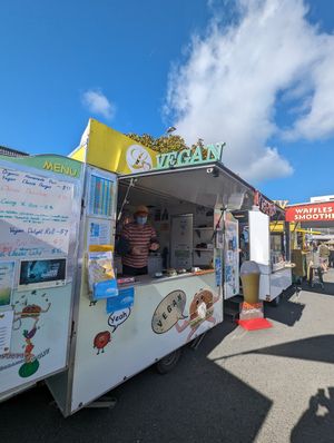 Outside at the market at Loving Hut Caravan in Nelson