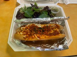 Meatball sub with dressed greens at Don't Have a Cow in Clarksville
