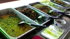 Food trays at Guan Yim in Lampang