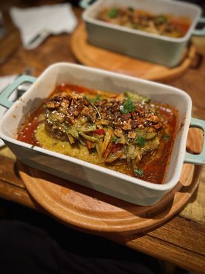 Oven-baked homemade seitan with Thai vegetables and topped with tofu cheese  at Karuzo in Sarajevo