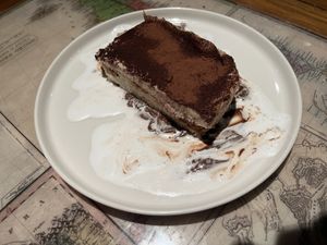Tiramisu made of homemade sponge fingers biscuits  at Karuzo in Sarajevo