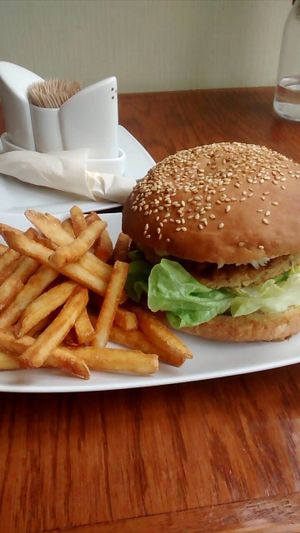 Vegan lentil burger with fries at Pizzeria Ambar in Bydgoszcz