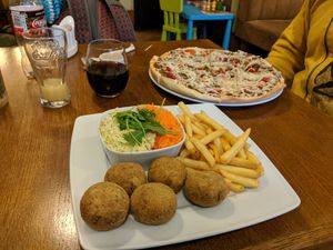Pizza no 9 and Vegan cutlets with fries and salads, utterly delicious!   at Pizzeria Ambar in Bydgoszcz