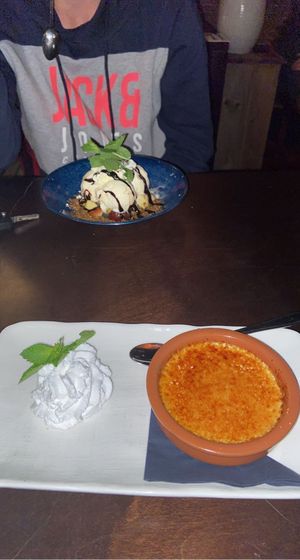Vegan Creme Brulee met slagroom at Eetcafe Spinoza in Leeuwarden