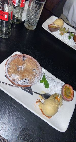 Vegan Apple Blueberry crumble met salted caramel ijs en slagroom at Eetcafe Spinoza in Leeuwarden
