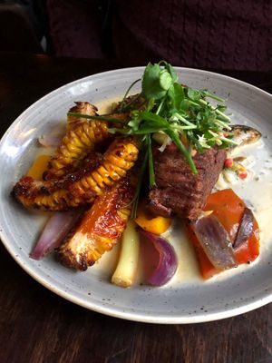 Vegan steak met juicy corn ribs. at Eetcafe Spinoza in Leeuwarden