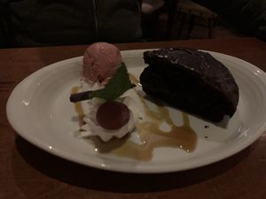 Chocolate cake with coconut ice cream  at Eetcafe Spinoza in Leeuwarden