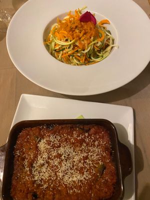 Raw spaghetti made from courgette and carrot, and the parmigiana Flora, sort of a cross between melanzane parmigiana and moussaka.  at Flora in Verona