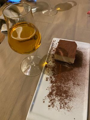Raw tiramisu, with a class of local Reicioto (dessert wine) as part of our €10 wine flight. at Flora in Verona